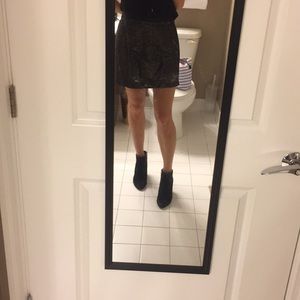 Black and gold metallic skirt.